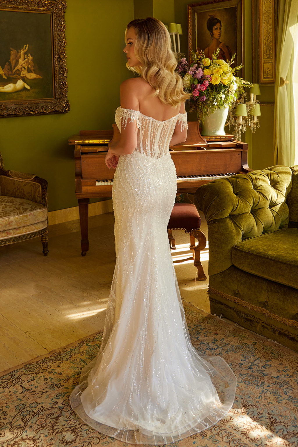 A large amount of beads and sequins decorate the corset bust and leads out GL3620 GLS BY ELIZABETH K