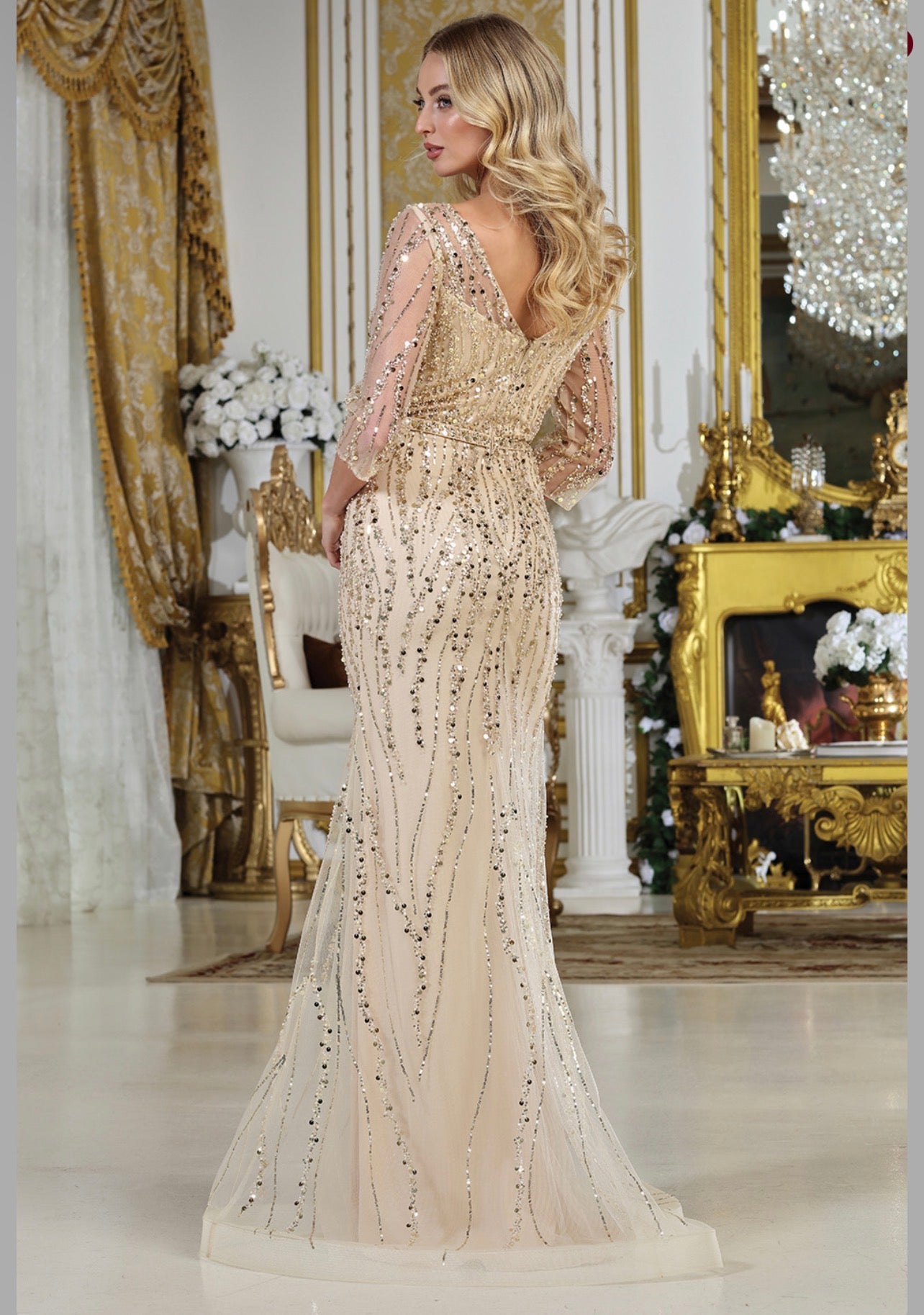Look opulent in this richly decorated dress with beads and sequins forming wavy patterns throughout. 3328-03 BY ADORA DESIGN
