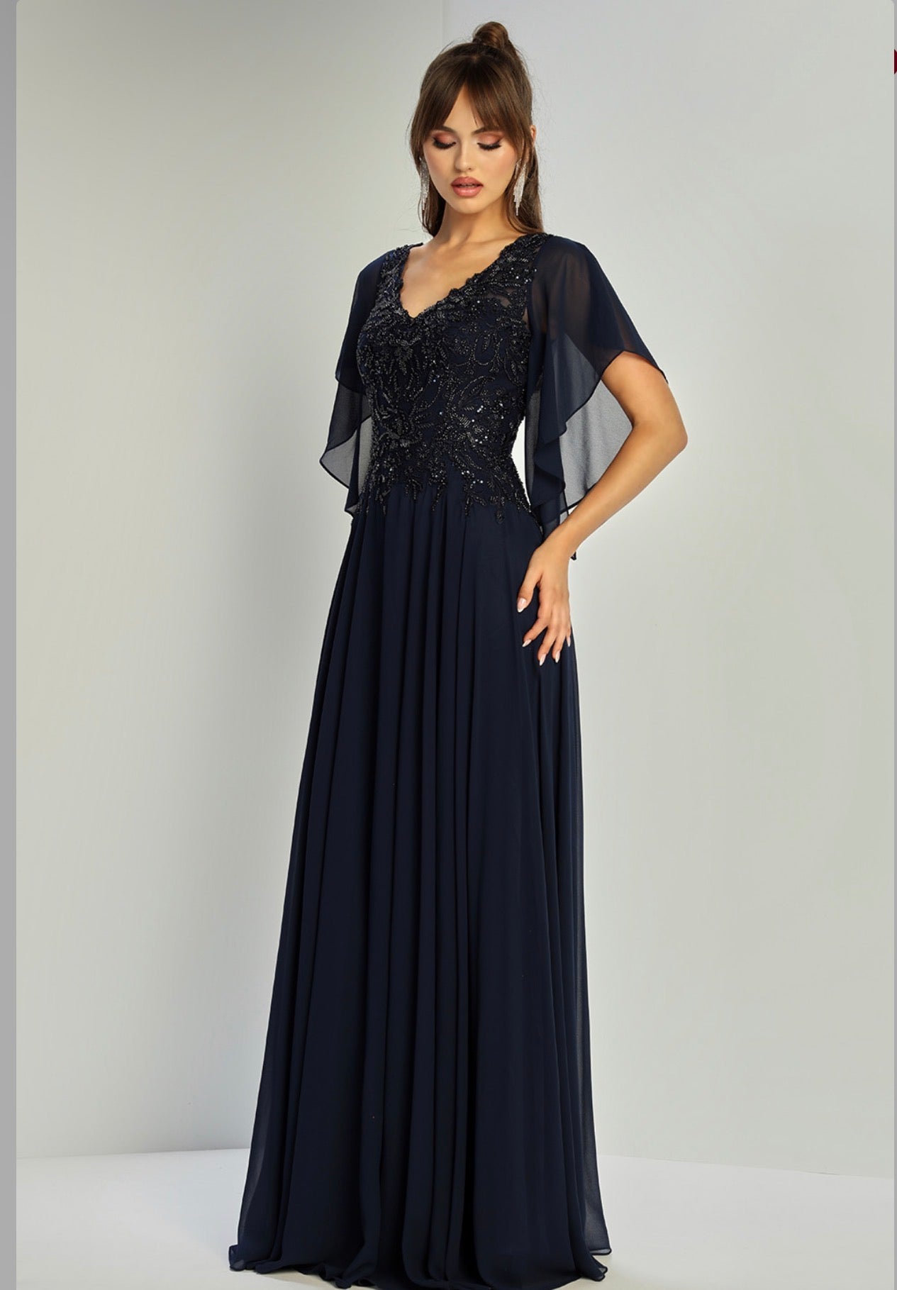 Show off in this beaded, sequin embroidered dress. 3318-03 BY ADORA DESIGN