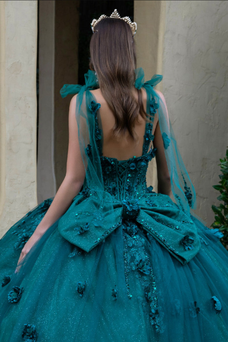 This floor length ball gown is embellished with 3D flower appliques, beads, and sequins. Gl3529 GLS by Gloria