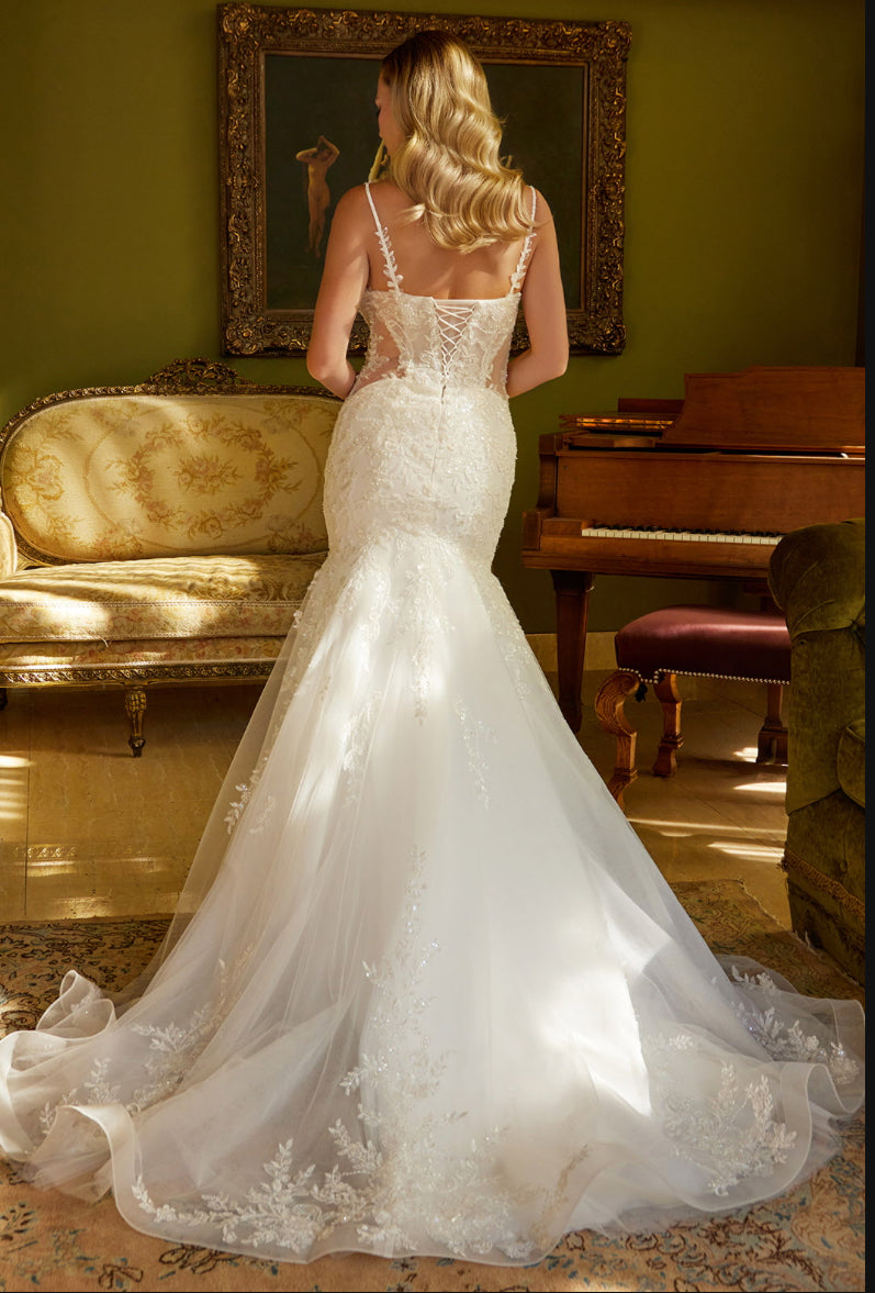 This mermaid silhouette wedding dress is embellished with beads, sequins and floral embroidery. GL3601 GLS by Gloria