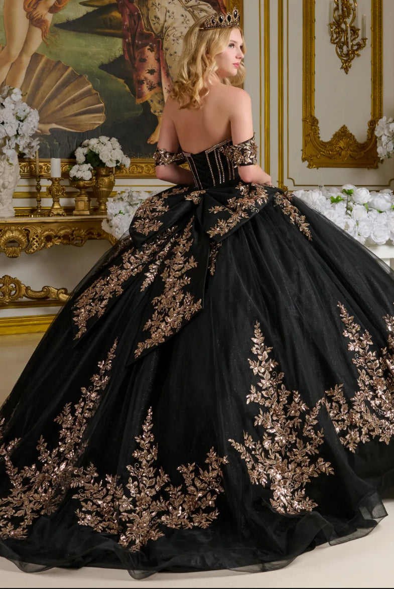 Adorned with 3D floral appliqués, embroidery, jewels, and sequins. GL3640 BY ELIZABETH K