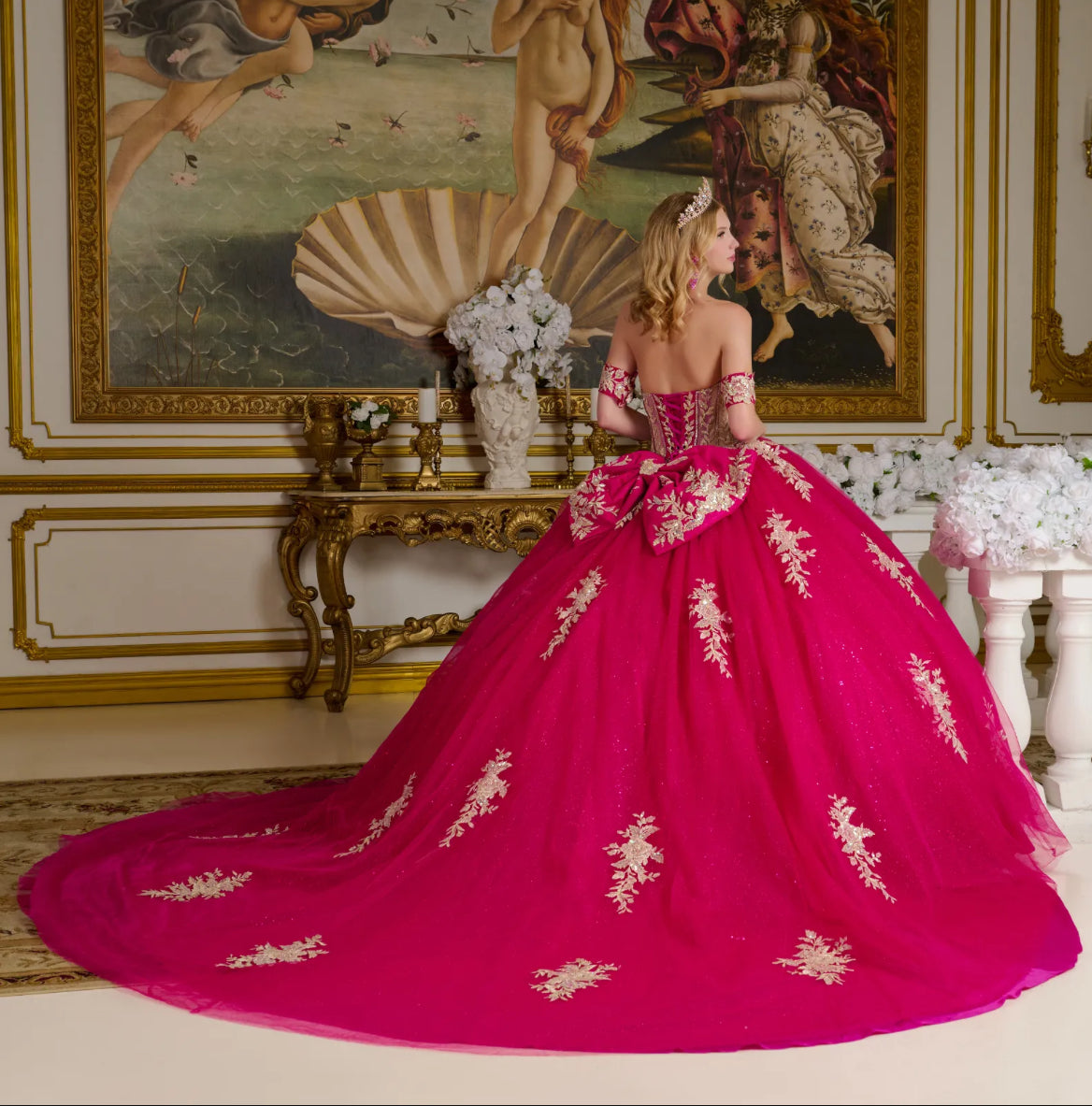This enchanting ball gown showcases a sheer sweetheart bodice richly adorned with shimmering jewels. GL3641 BY ELIZABETH K