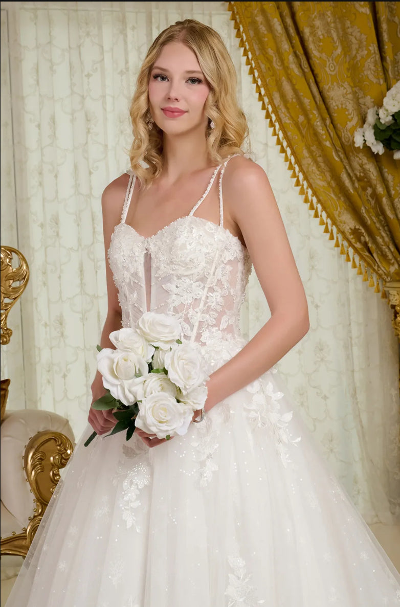Two beaded spaghetti straps delicately connect to the sweetheart neckline bodice on this A-line wedding gown. GL3660 GLS BY GLORIA