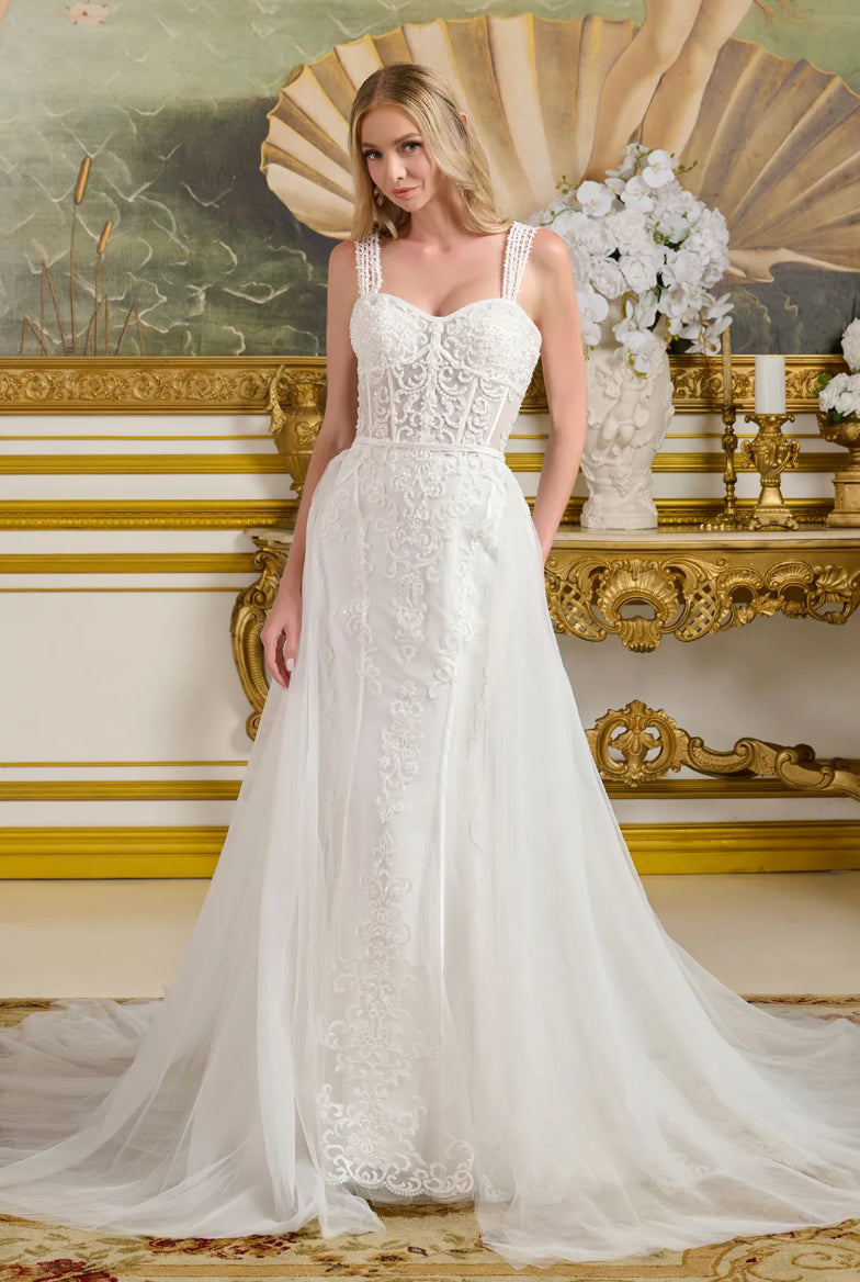 This form-fitting wedding gown features multiple beaded spaghetti straps that connect to the sweetheart neckline bodice. GL3654 GLS BY GLORIA