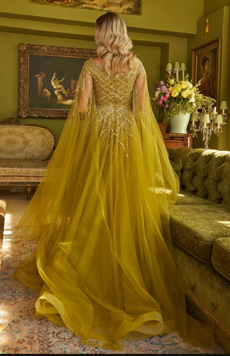Feel glamorous in this bead, jewel, and sequin adorned dress. GL3606 GLS BY GLORIA