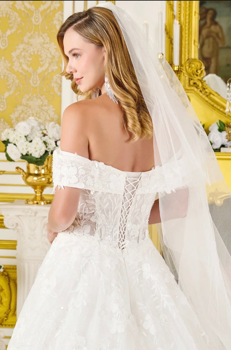 Timeless elegance meets modern sparkle in this stunning ball gown wedding dress. GL3821 GLS BY GLORIA
