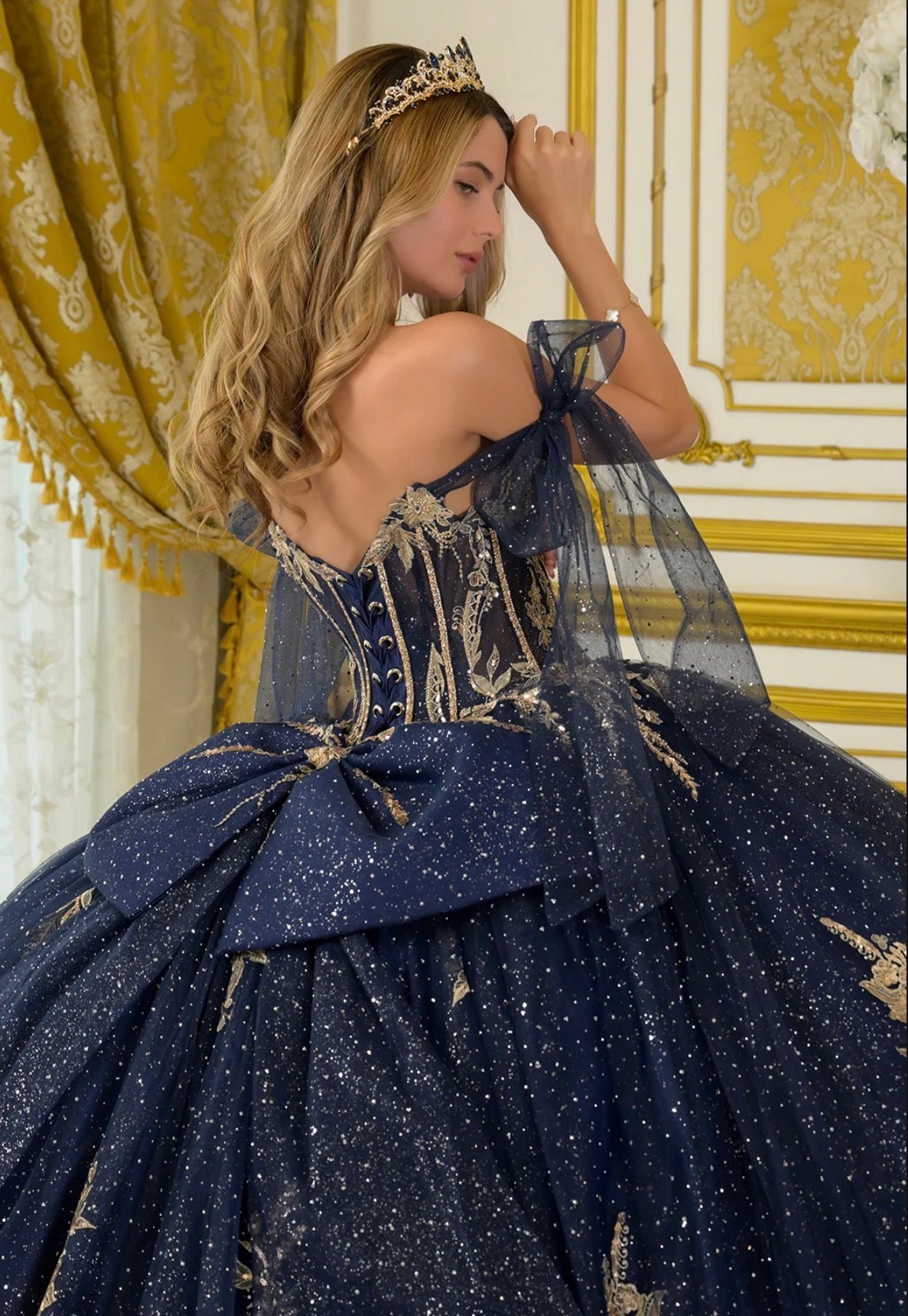 Tie-able off-shoulder straps crafted from glitter tulle frame. GL3710 BY ELIZABETH K