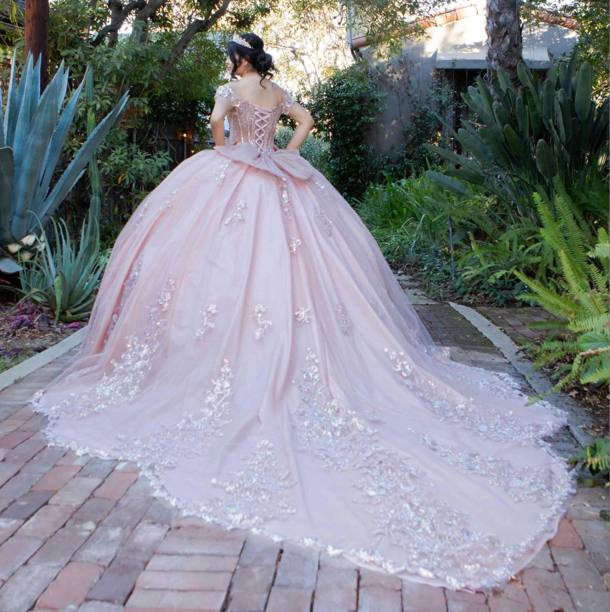 embellished off-the-shoulder straps that frame a flattering V-neckline corset bodice.8370J BY CINDERELLA COUTURE