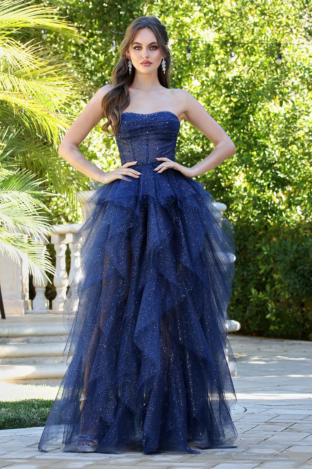 This dress combines elegance and sparkle for a standout look. 3210 BY ADORA DESIGN
