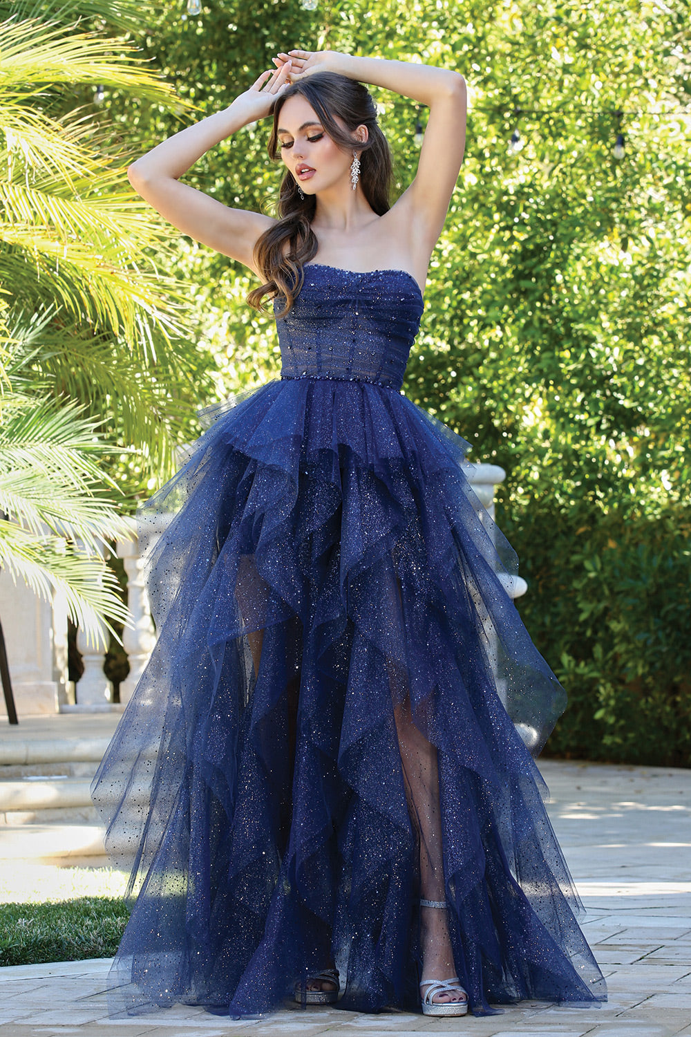 This dress combines elegance and sparkle for a standout look. 3210 BY ADORA DESIGN