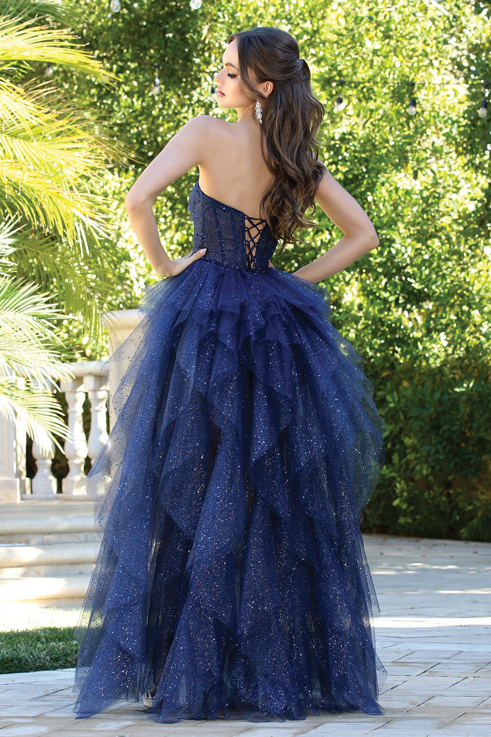 This dress combines elegance and sparkle for a standout look. 3210 BY ADORA DESIGN