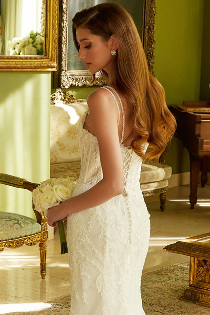 This fitted wedding dress features a double spaghetti-strap, GL3531 (GLS) BY GLORIA