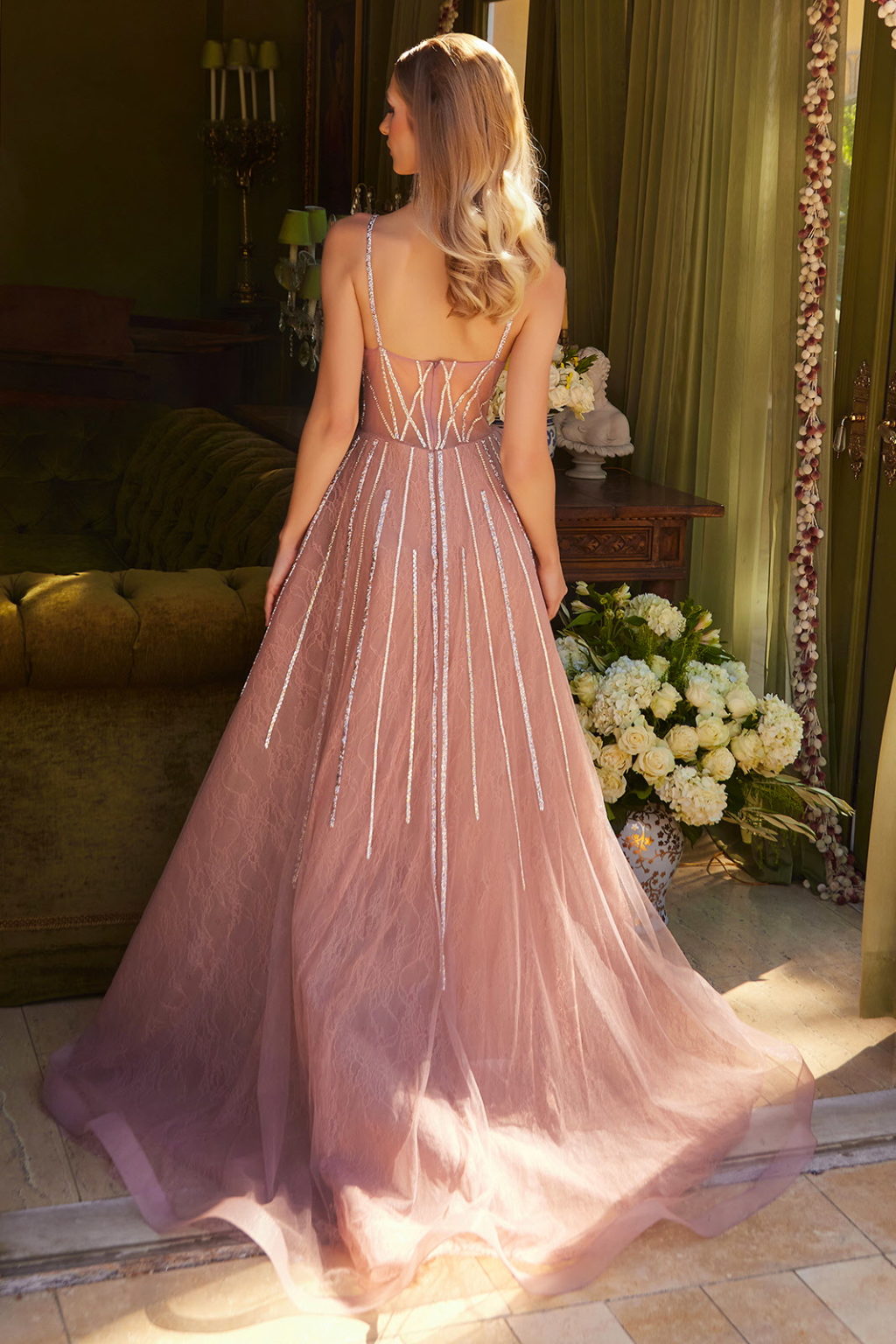 Bejeweled trim that form line patterns are seen throughout this A-line silhouette dress GL3617 GLS BY GLORIA