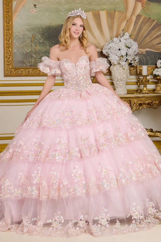 These embellishments continue throughout the layered skirt, which features scalloped embroidery along the hem. GL3650 (GLS) BY ELIZABETH K