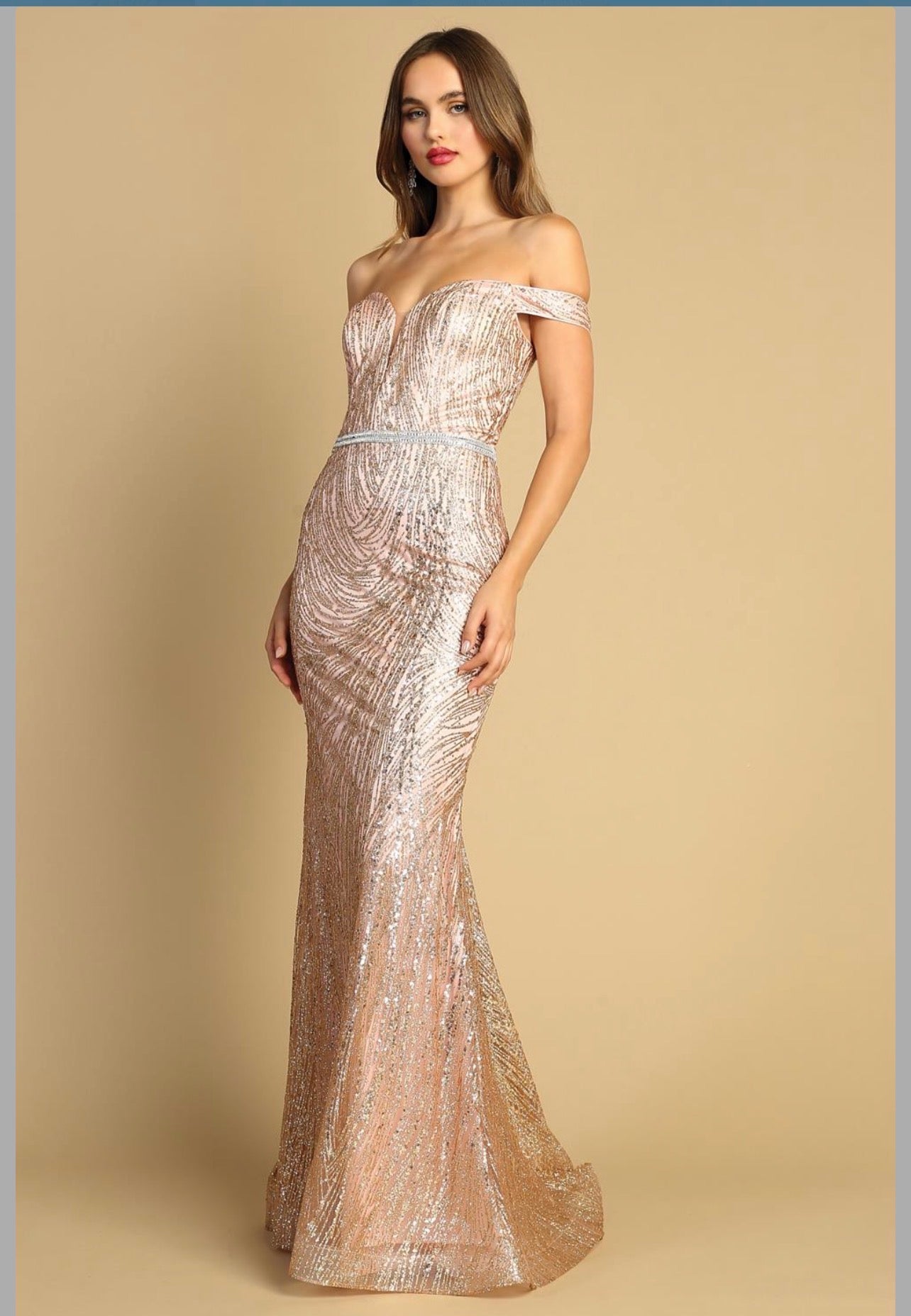 With glitter fabric and a little touch of diamond belt . 3093 by ADORA DESIGN