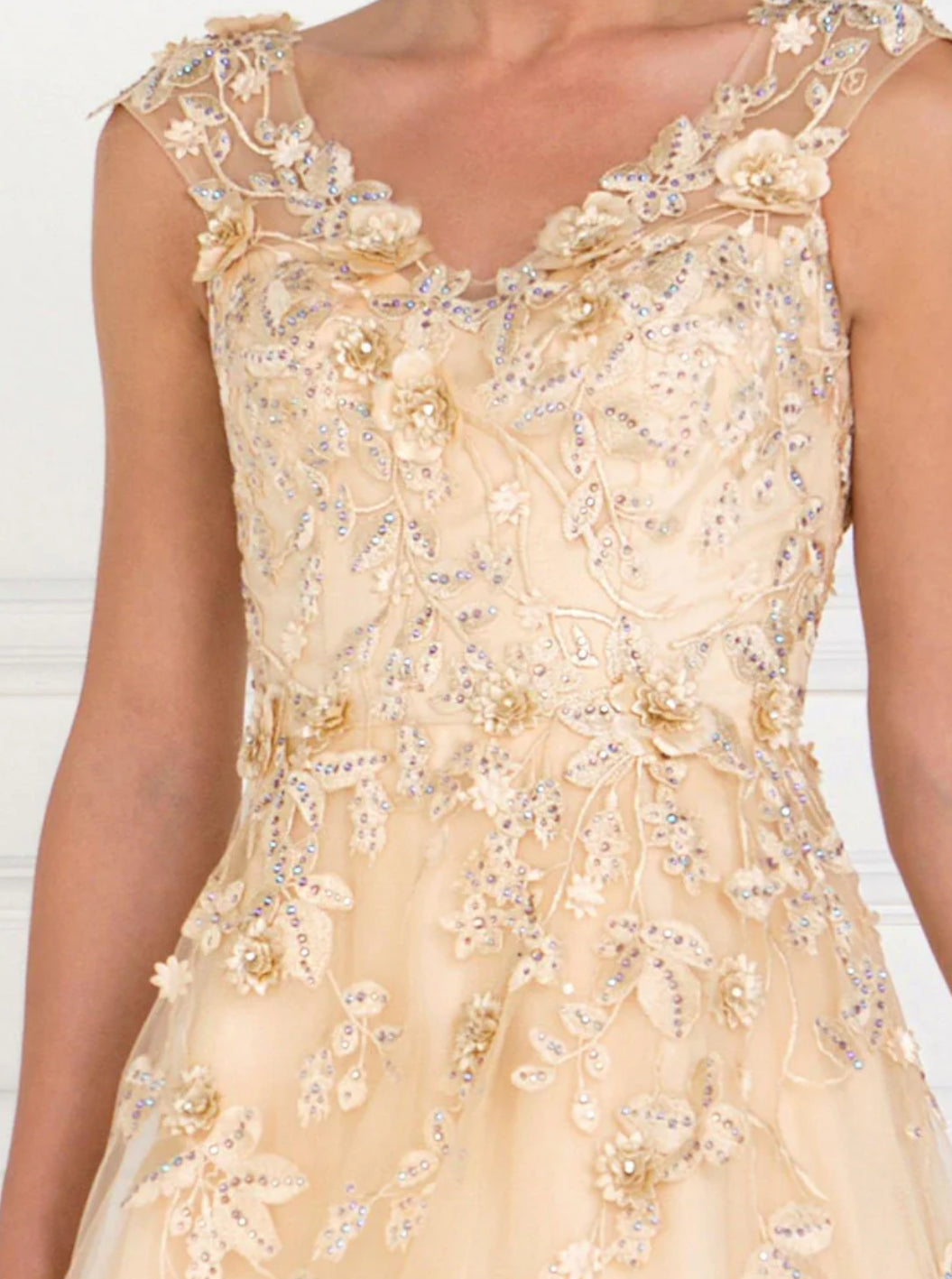 This gorgeous long dress features a sleeveless V-neckline. Floor length A-line dress with embellished rhinestones and lace applique design. GL1517 BY GLS