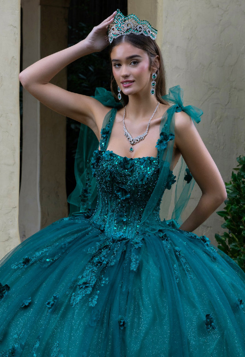 This floor length ball gown is embellished with 3D flower appliques, beads, and sequins. Gl3529 GLS by Gloria