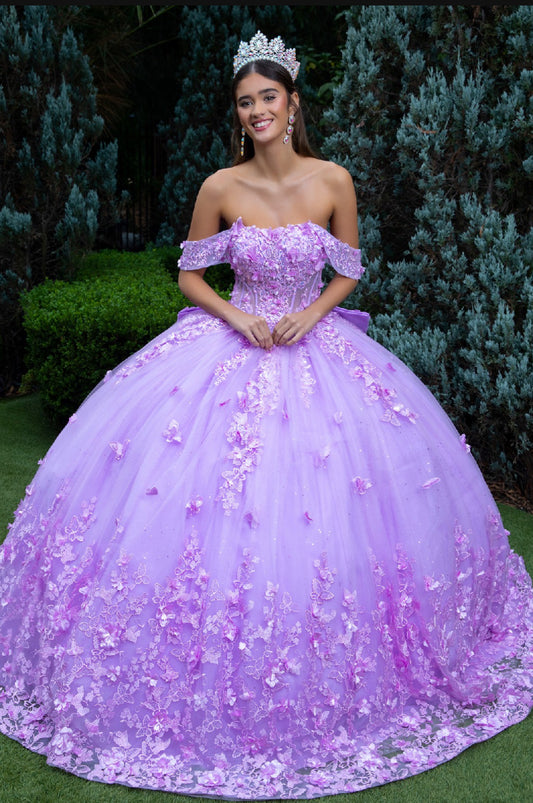 This floor length ball gown is heavily adorned with 3D flower and butterfly appliques, jewels and sequined embroidery. GL3524 (GLS) by Gloria