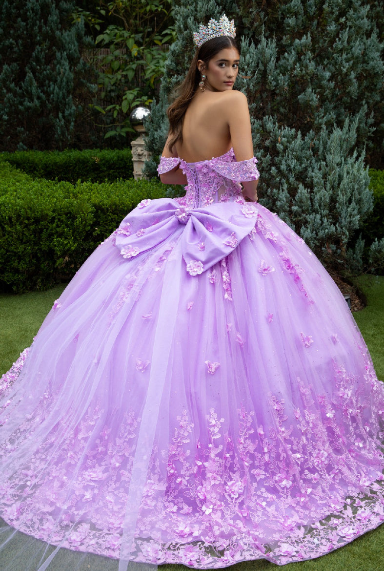 This floor length ball gown is heavily adorned with 3D flower and butterfly appliques, jewels and sequined embroidery. GL3524 (GLS) by Gloria