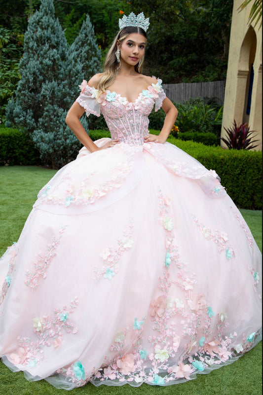 With 3D flower appliques, beads, embroidery, jewels and glitter, this ball gown presents an image of loveliness. GL3554 GLS by Gloria