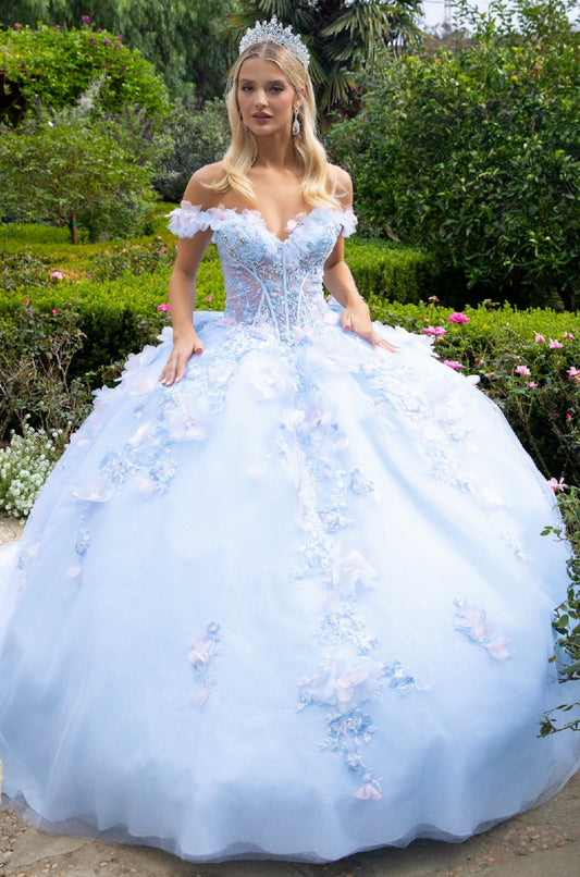 The v-neckline, sheer corset bodice connects to off-shoulder straps with the help of 3D flower appliques and ruffles. GL3555 GLS by Gloria