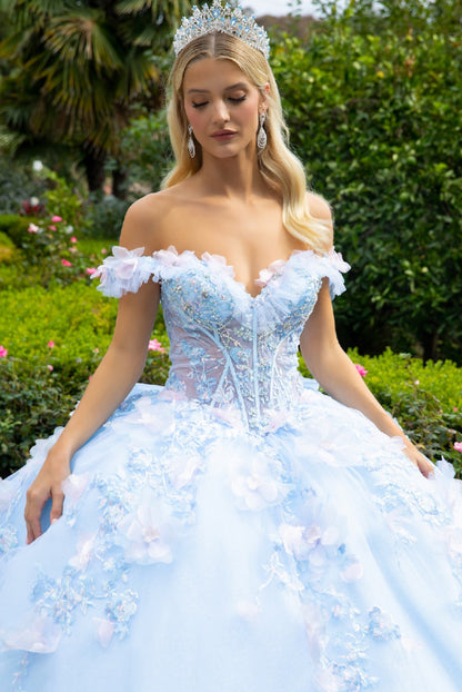 The v-neckline, sheer corset bodice connects to off-shoulder straps with the help of 3D flower appliques and ruffles. GL3555 GLS by Gloria