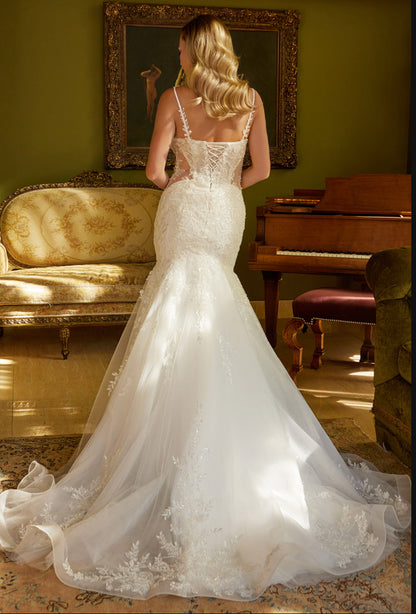 This mermaid silhouette wedding dress is embellished with beads, sequins and floral embroidery. GL3601 GLS by Gloria