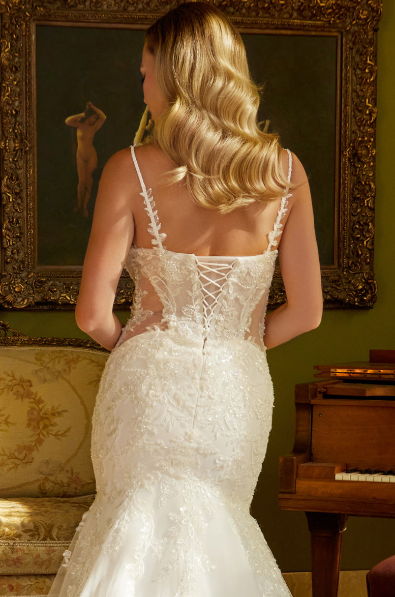 This mermaid silhouette wedding dress is embellished with beads, sequins and floral embroidery. GL3601 GLS by Gloria