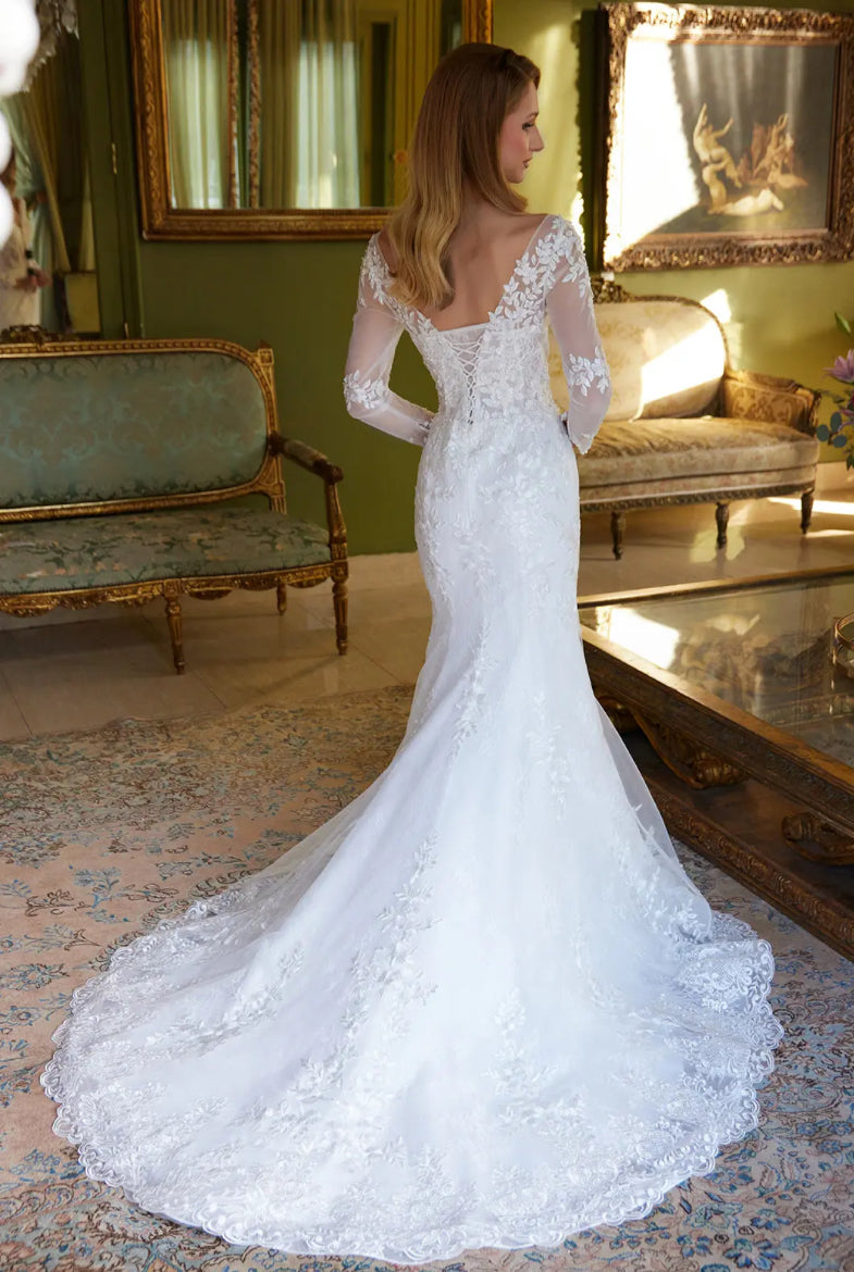 With beads and embroidery decorating this mermaid silhouette dress. GL3605 GLS BY GLORIA