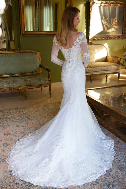 With beads and embroidery decorating this mermaid silhouette dress. GL3605 GLS BY GLORIA
