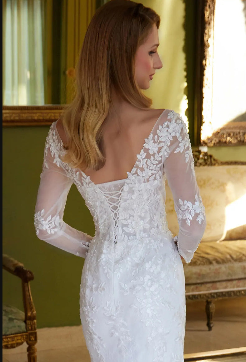 With beads and embroidery decorating this mermaid silhouette dress. GL3605 GLS BY GLORIA