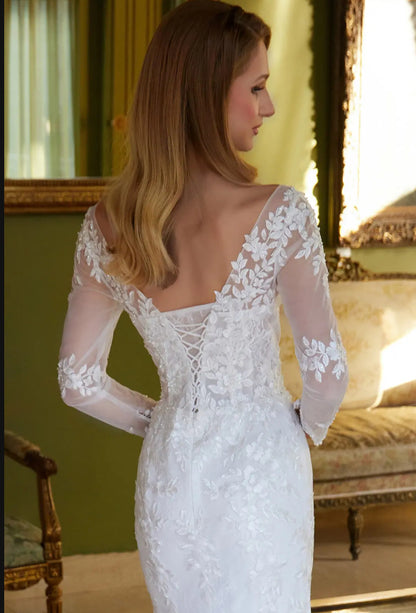 With beads and embroidery decorating this mermaid silhouette dress. GL3605 GLS BY GLORIA