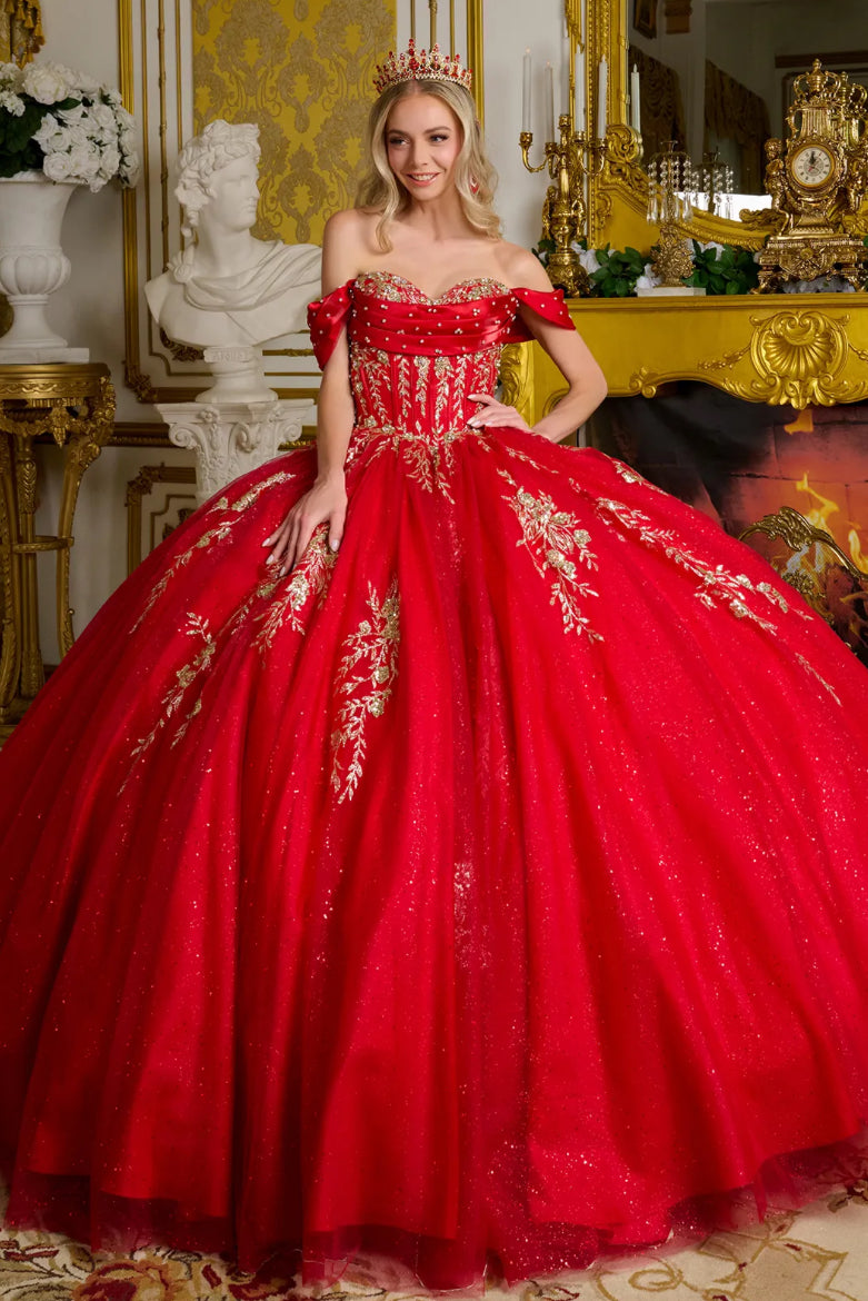 The gown is richly adorned with jewels, sequins, and glitter. GL3631 GLS BY ELIZABETH K