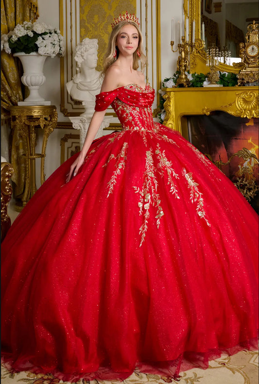 The gown is richly adorned with jewels, sequins, and glitter. GL3631 GLS BY ELIZABETH K
