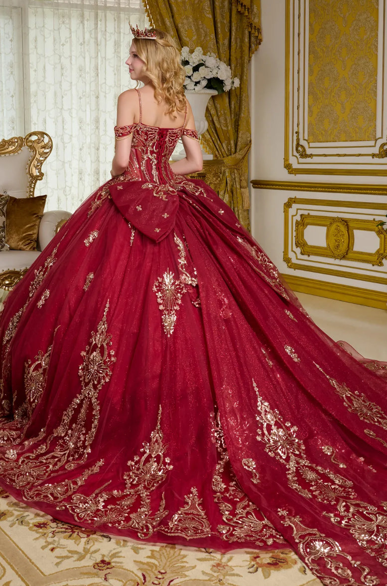 This ball gown has a combination of bejeweled spaghetti straps and ornate off-shoulder straps. GL3639 BY ELIZABETH K