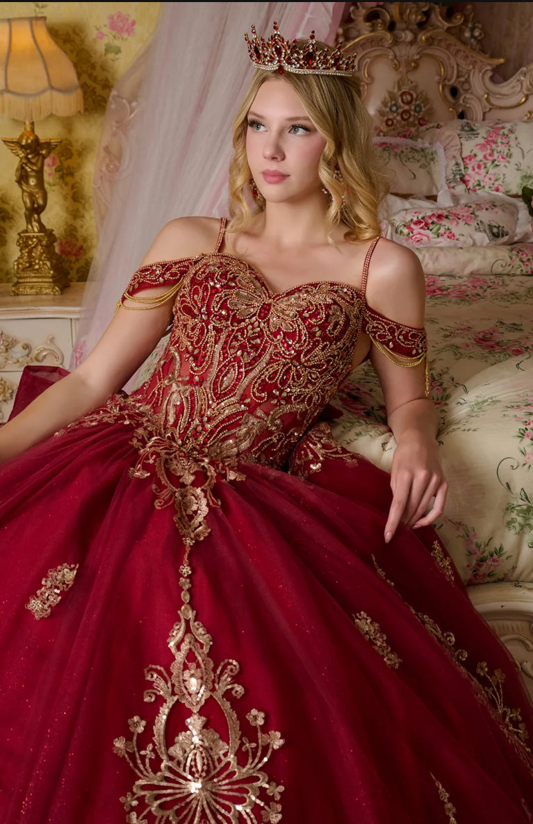This ball gown has a combination of bejeweled spaghetti straps and ornate off-shoulder straps. GL3639 BY ELIZABETH K