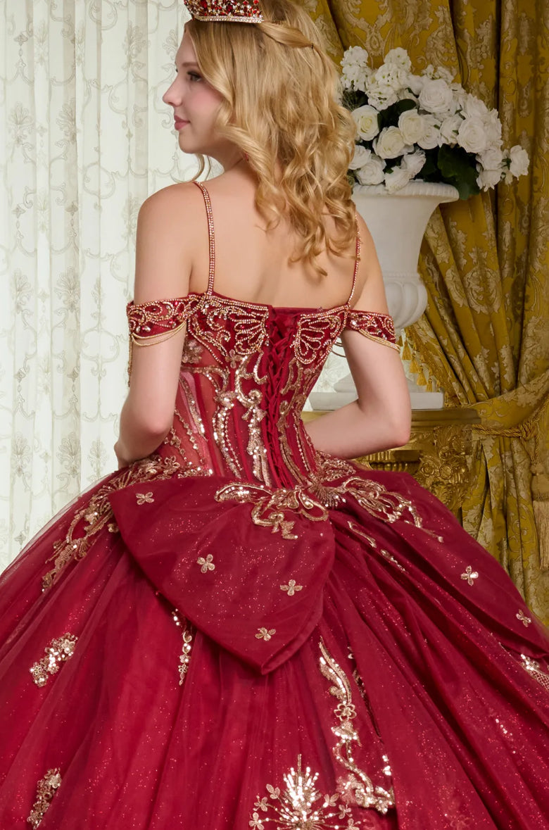 This ball gown has a combination of bejeweled spaghetti straps and ornate off-shoulder straps. GL3639 BY ELIZABETH K