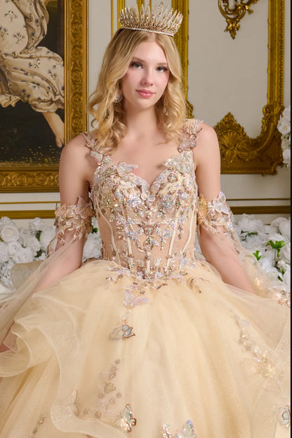 This enchanting ball gown is supported by sheer shoulder straps and adorned with intricate 3D butterfly appliqués. GL3646 BY ELIZABETH K