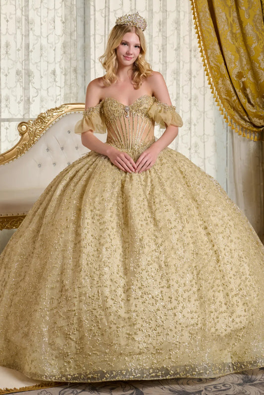 This ball gown showcases a sheer, bejeweled corset bodice paired with off-the-shoulder bubble hem sleeves. GL3632 BY ELIZABETH K