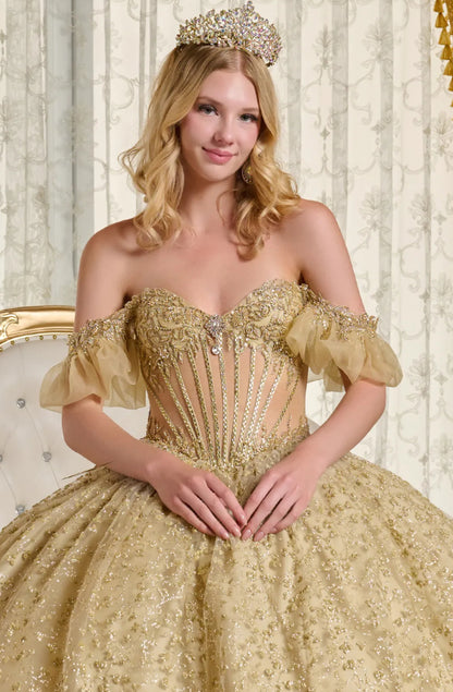 This ball gown showcases a sheer, bejeweled corset bodice paired with off-the-shoulder bubble hem sleeves. GL3632 BY ELIZABETH K
