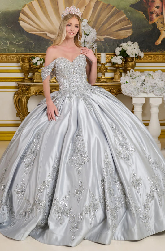 This satin ball gown is richly adorned with 3D floral appliqués, beading, embroidery, jewels, and sequins.  GL3643 ELIZABETH K