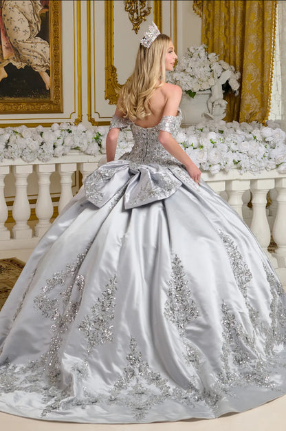 This satin ball gown is richly adorned with 3D floral appliqués, beading, embroidery, jewels, and sequins.  GL3643 ELIZABETH K