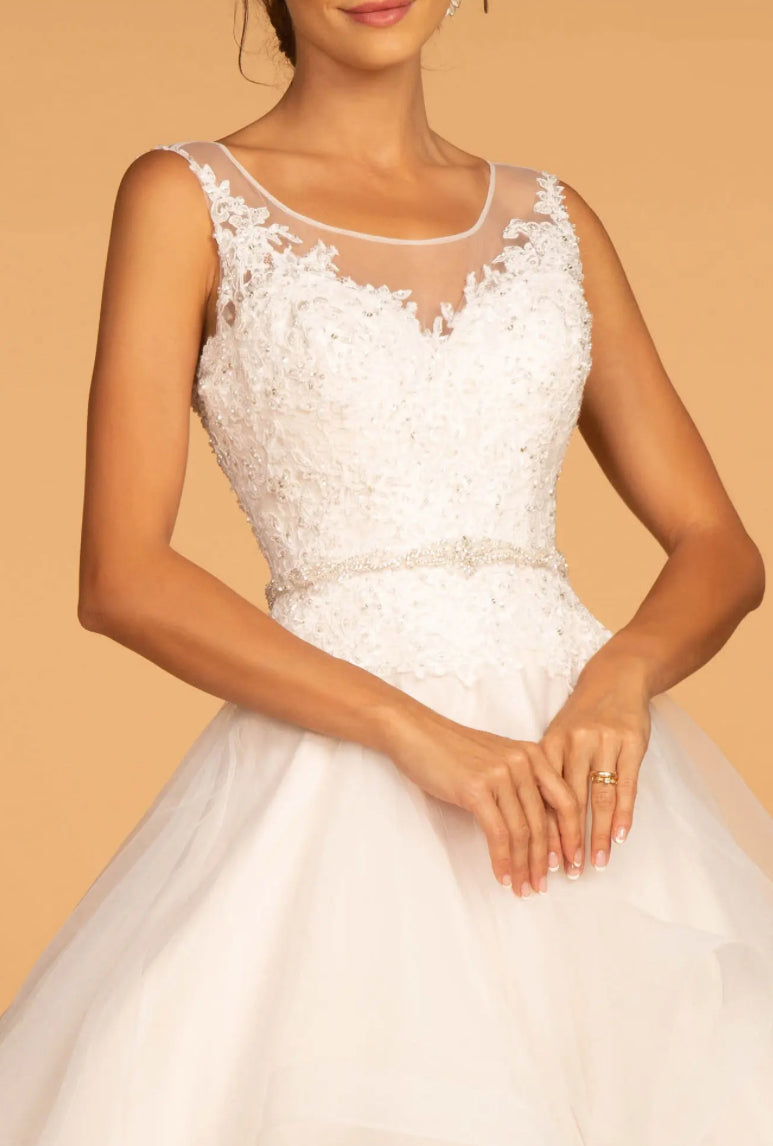 Embroidered Bodice Layered Hem Tulle Wedding Gown Let's take a look at this classic wedding dress. GL2599 GLS BY GLORIA