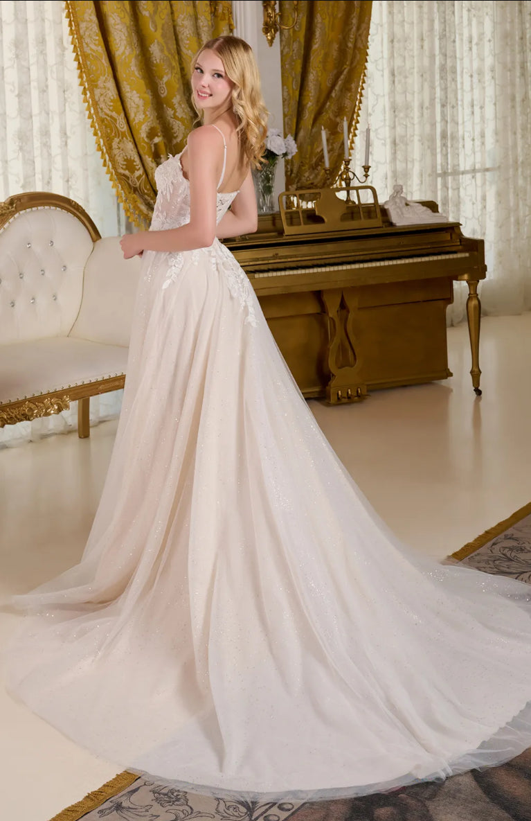 This A-line wedding dress is supported by delicate spaghetti straps. GL3663 GLS BY GLORIA