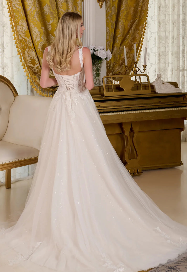 This A-line wedding gown features a V-neckline bodice supported by straps. GL3662 GLS BY GLORIA