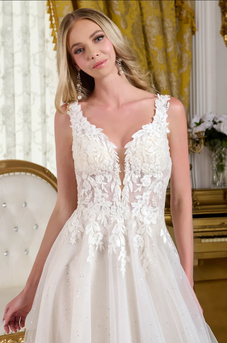 This A-line wedding dress features a fitted bodice with straps adorned in beads, embroidery, and glitter. GL3661 GLS BY GLORIA