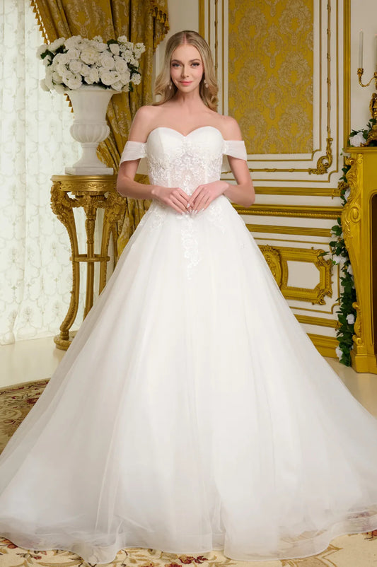 This elegant wedding gown showcases a voluminous. GL3657 GLS BY GLORIA