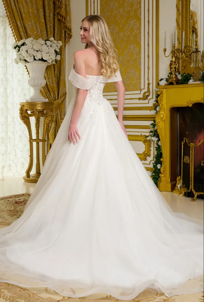 This elegant wedding gown showcases a voluminous. GL3657 GLS BY GLORIA