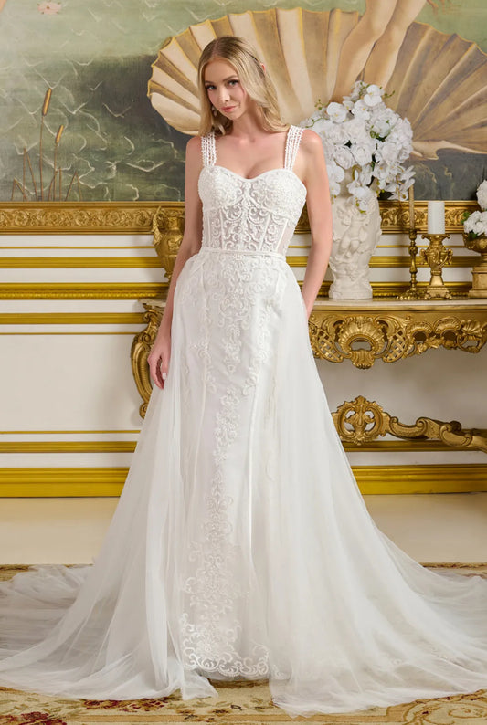 This form-fitting wedding gown features multiple beaded spaghetti straps that connect to the sweetheart neckline bodice. GL3654 GLS BY GLORIA